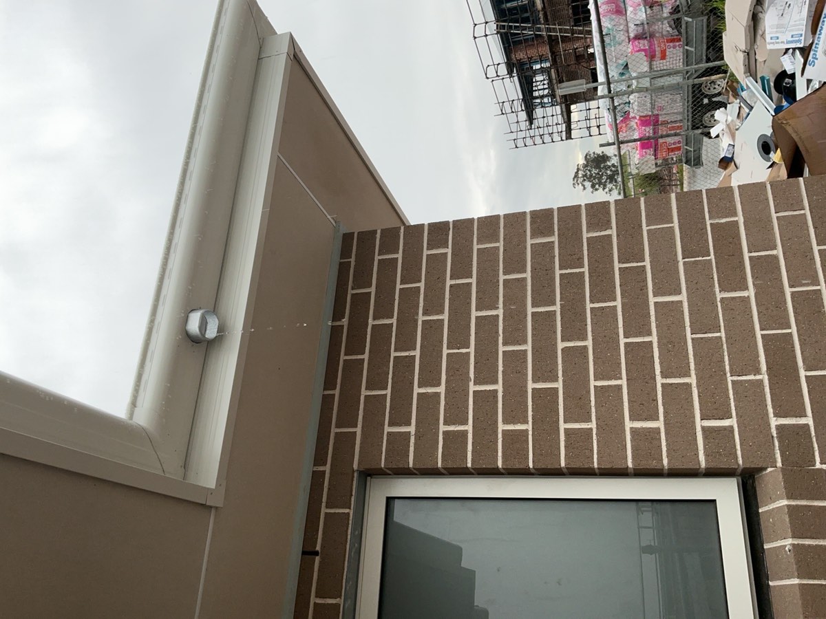 Temporary downpipes not installed, recorded during a lock-up inspection in Leppington